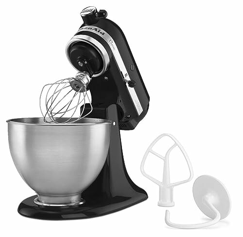 Black stand mixer with mixing bowl and attachments