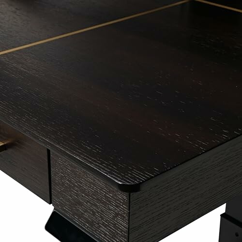Close-up of a dark wooden table corner with visible grain