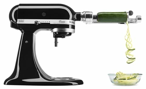 KitchenAid mixer with spiralizer attachment and zucchini noodles.